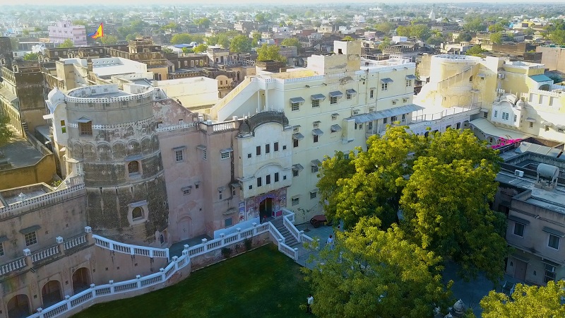 Rajasthan Fort Hotel Castle Mandawa Shekhawati drone ariel photo of turrets and the town