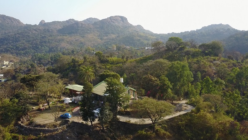 Forest Eco Lodge Mount Abu Rajasthan drone photo of homestay and  mountains